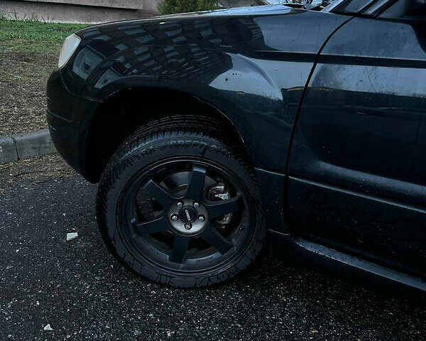 Черный Субару Форестер, объемом двигателя 2 л и пробегом 266 тыс. км за 5700 $, фото 6 на Automoto.ua