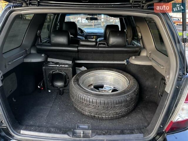Черный Субару Форестер, объемом двигателя 2.5 л и пробегом 235 тыс. км за 5650 $, фото 10 на Automoto.ua