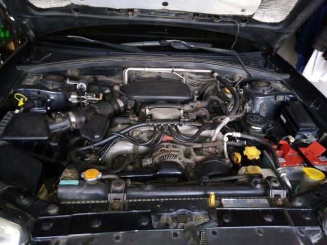 Черный Субару Форестер, объемом двигателя 2 л и пробегом 270 тыс. км за 6700 $, фото 2 на Automoto.ua