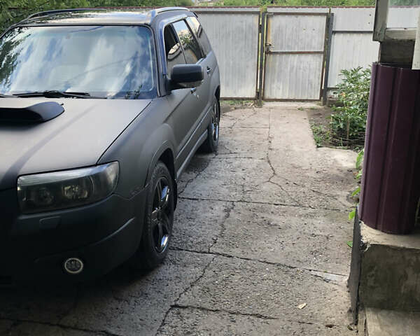 Черный Субару Форестер, объемом двигателя 2.5 л и пробегом 280 тыс. км за 9000 $, фото 1 на Automoto.ua