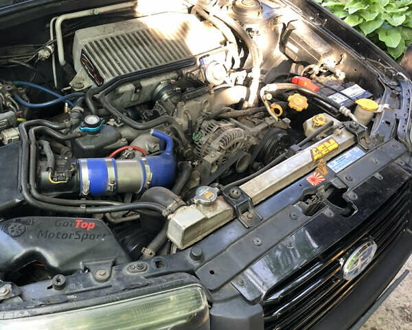 Черный Субару Форестер, объемом двигателя 2.5 л и пробегом 280 тыс. км за 9000 $, фото 8 на Automoto.ua