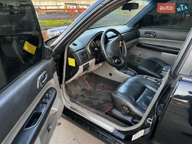 Черный Субару Форестер, объемом двигателя 2.5 л и пробегом 235 тыс. км за 5650 $, фото 8 на Automoto.ua