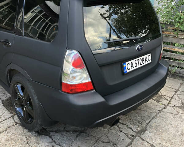Черный Субару Форестер, объемом двигателя 2.5 л и пробегом 280 тыс. км за 9000 $, фото 2 на Automoto.ua