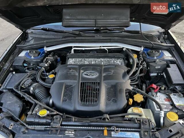 Черный Субару Форестер, объемом двигателя 2.5 л и пробегом 235 тыс. км за 5650 $, фото 2 на Automoto.ua