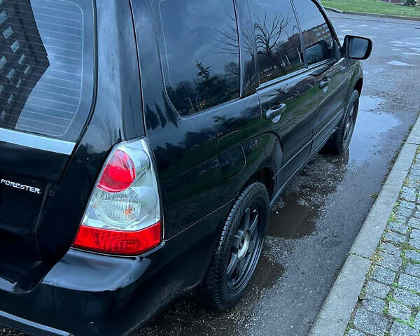 Черный Субару Форестер, объемом двигателя 2 л и пробегом 266 тыс. км за 5700 $, фото 8 на Automoto.ua