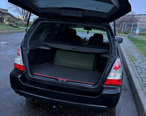 Черный Субару Форестер, объемом двигателя 2 л и пробегом 266 тыс. км за 5700 $, фото 10 на Automoto.ua