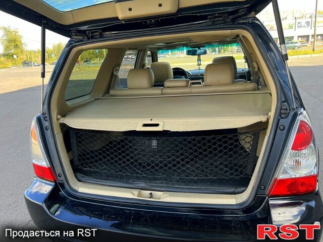 Субару Forester 2006 у Кривому Розі на Automoto.ua Чорний Субару Forester, об'ємом двигуна 2 л та пробігом 257 тис. км за 4999 $, фото 4 на Automoto.ua