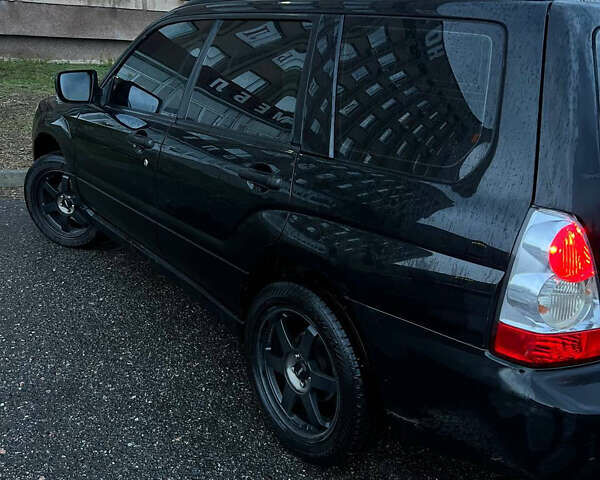 Черный Субару Форестер, объемом двигателя 2 л и пробегом 266 тыс. км за 5700 $, фото 5 на Automoto.ua