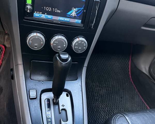 Черный Субару Форестер, объемом двигателя 2.5 л и пробегом 235 тыс. км за 5650 $, фото 4 на Automoto.ua