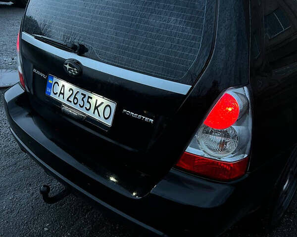 Черный Субару Форестер, объемом двигателя 2 л и пробегом 266 тыс. км за 5700 $, фото 9 на Automoto.ua
