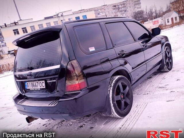 Чорний Субару Forester, об'ємом двигуна 2.5 л та пробігом 270 тис. км за 7699 $, фото 5 на Automoto.ua