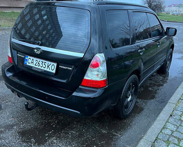 Черный Субару Форестер, объемом двигателя 2 л и пробегом 266 тыс. км за 5700 $, фото 7 на Automoto.ua