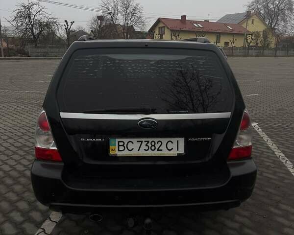 Черный Субару Форестер, объемом двигателя 1.99 л и пробегом 277 тыс. км за 6500 $, фото 18 на Automoto.ua