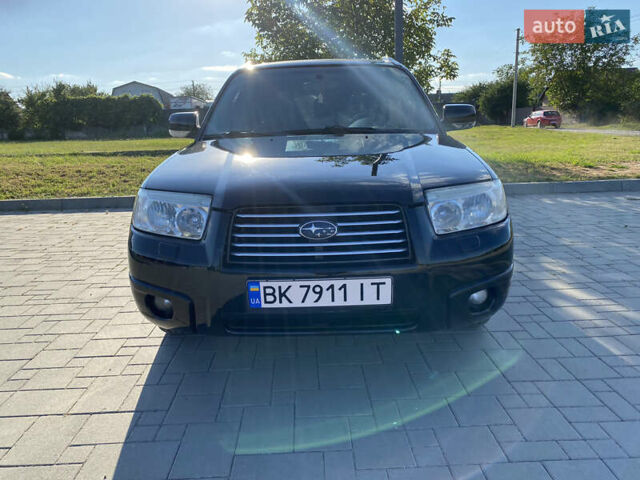 Черный Субару Форестер, объемом двигателя 1.99 л и пробегом 345 тыс. км за 6700 $, фото 2 на Automoto.ua