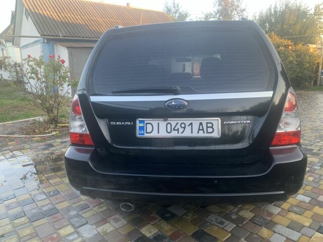 Чорний Субару Forester, об'ємом двигуна 2 л та пробігом 258 тис. км за 5800 $, фото 5 на Automoto.ua