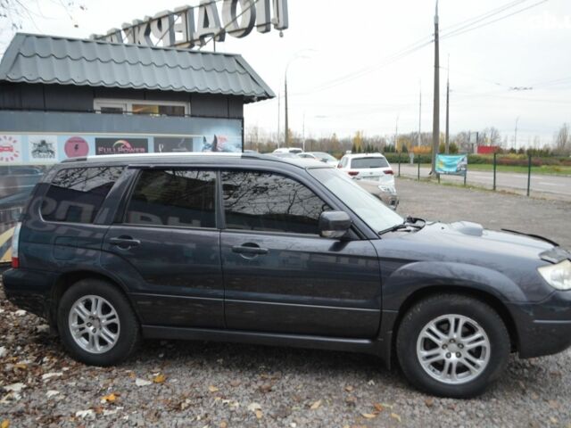 Черный Субару Форестер, объемом двигателя 2.5 л и пробегом 292 тыс. км за 7000 $, фото 5 на Automoto.ua