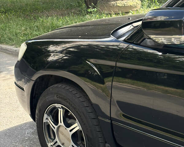 Черный Субару Форестер, объемом двигателя 2 л и пробегом 196 тыс. км за 7000 $, фото 2 на Automoto.ua