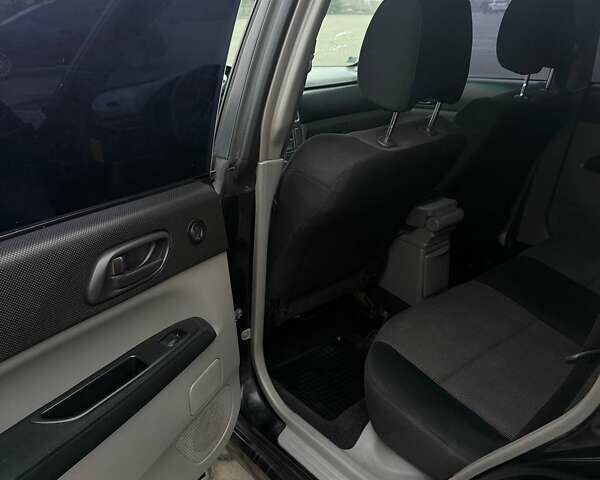 Черный Субару Форестер, объемом двигателя 1.99 л и пробегом 277 тыс. км за 6500 $, фото 6 на Automoto.ua