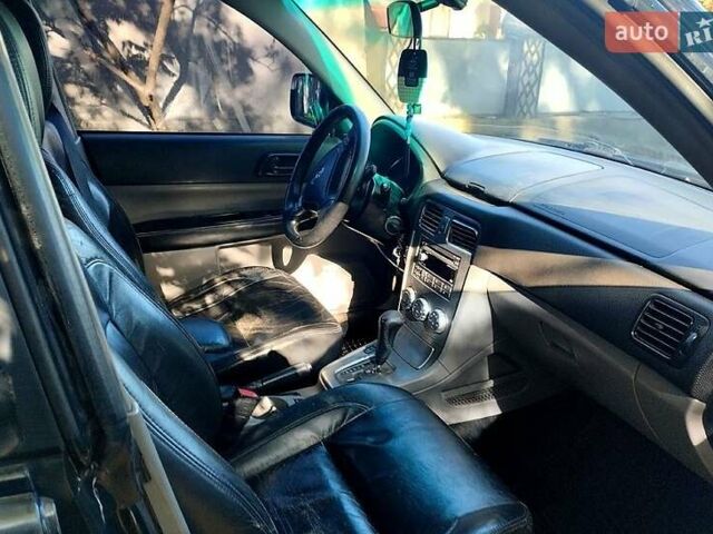 Субару Forester 2007 у Чернівцях на Automoto.ua Чорний Субару Forester, об'ємом двигуна 2 л та пробігом 180 тис. км за 5300 $, фото 3 на Automoto.ua