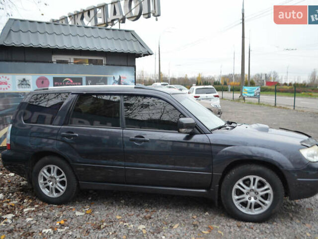 Черный Субару Форестер, объемом двигателя 2.5 л и пробегом 292 тыс. км за 7000 $, фото 5 на Automoto.ua