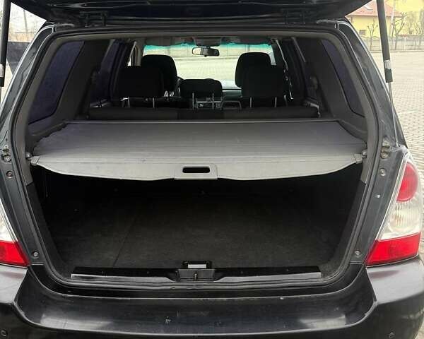 Черный Субару Форестер, объемом двигателя 1.99 л и пробегом 277 тыс. км за 6500 $, фото 11 на Automoto.ua