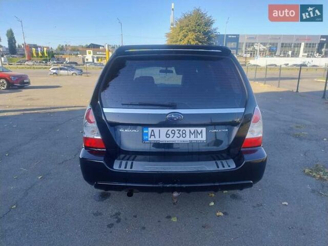 Чорний Субару Forester, об'ємом двигуна 1.99 л та пробігом 315 тис. км за 5750 $, фото 2 на Automoto.ua