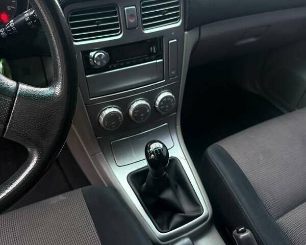 Черный Субару Форестер, объемом двигателя 1.99 л и пробегом 277 тыс. км за 6500 $, фото 5 на Automoto.ua