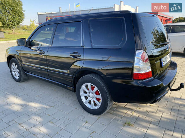 Черный Субару Форестер, объемом двигателя 1.99 л и пробегом 345 тыс. км за 6700 $, фото 4 на Automoto.ua