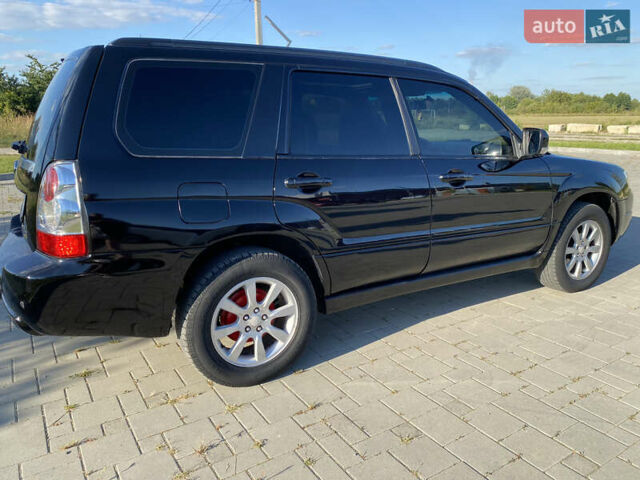 Черный Субару Форестер, объемом двигателя 1.99 л и пробегом 345 тыс. км за 6700 $, фото 3 на Automoto.ua