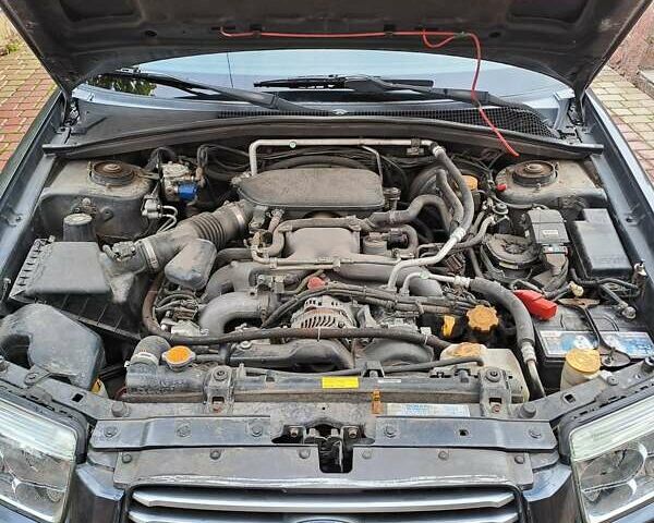 Черный Субару Форестер, объемом двигателя 1.99 л и пробегом 225 тыс. км за 8000 $, фото 12 на Automoto.ua