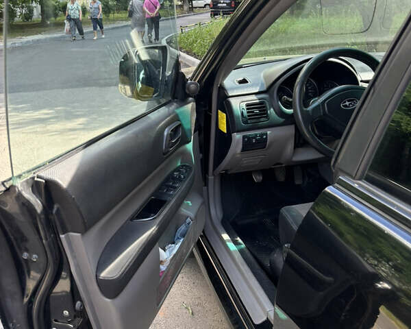 Черный Субару Форестер, объемом двигателя 2 л и пробегом 196 тыс. км за 7000 $, фото 9 на Automoto.ua