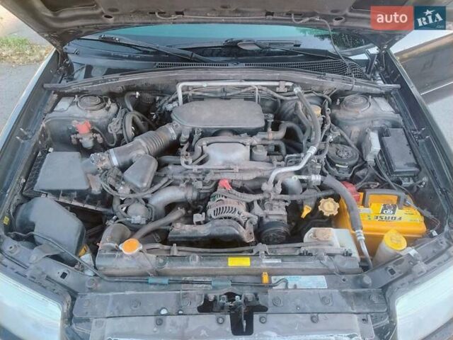 Чорний Субару Forester, об'ємом двигуна 1.99 л та пробігом 315 тис. км за 5750 $, фото 12 на Automoto.ua