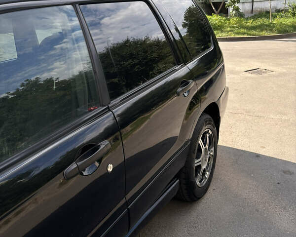 Черный Субару Форестер, объемом двигателя 2 л и пробегом 196 тыс. км за 7000 $, фото 3 на Automoto.ua