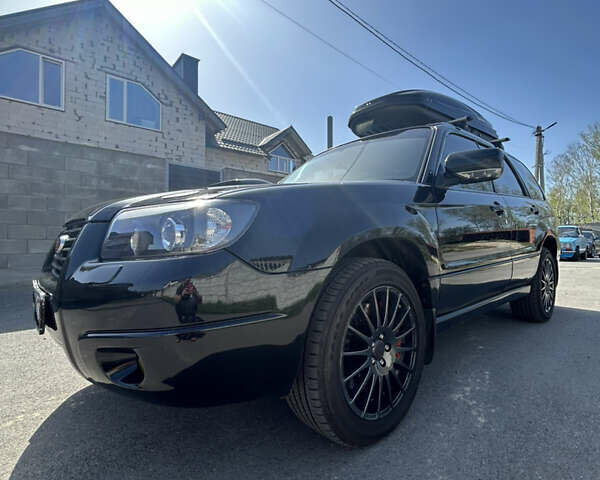 Чорний Субару Forester, об'ємом двигуна 2.5 л та пробігом 235 тис. км за 10500 $, фото 6 на Automoto.ua