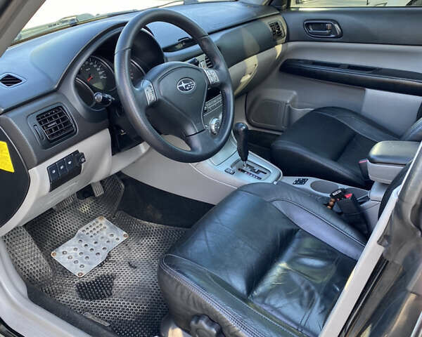 Черный Субару Форестер, объемом двигателя 1.99 л и пробегом 345 тыс. км за 6700 $, фото 7 на Automoto.ua