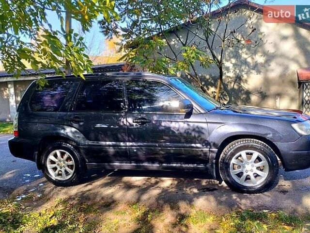 Субару Forester 2007 у Чернівцях на Automoto.ua Чорний Субару Forester, об'ємом двигуна 2 л та пробігом 180 тис. км за 5300 $, фото 9 на Automoto.ua