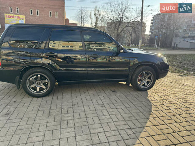 Чорний Субару Forester, об'ємом двигуна 2 л та пробігом 260 тис. км за 6400 $, фото 6 на Automoto.ua
