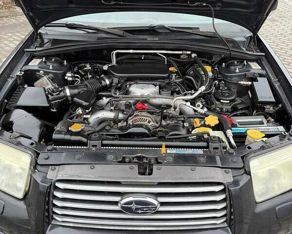 Черный Субару Форестер, объемом двигателя 1.99 л и пробегом 277 тыс. км за 6500 $, фото 21 на Automoto.ua