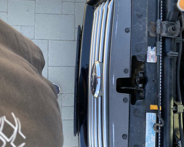 Черный Субару Форестер, объемом двигателя 1.99 л и пробегом 345 тыс. км за 6700 $, фото 16 на Automoto.ua