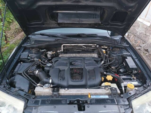 Черный Субару Форестер, объемом двигателя 2.5 л и пробегом 273 тыс. км за 8500 $, фото 10 на Automoto.ua