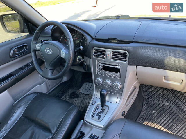 Черный Субару Форестер, объемом двигателя 1.99 л и пробегом 345 тыс. км за 6700 $, фото 8 на Automoto.ua