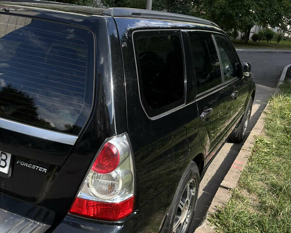 Черный Субару Форестер, объемом двигателя 2 л и пробегом 196 тыс. км за 7000 $, фото 17 на Automoto.ua