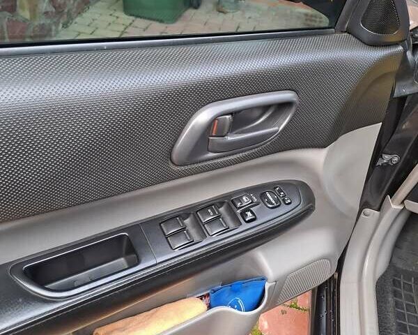 Черный Субару Форестер, объемом двигателя 1.99 л и пробегом 225 тыс. км за 8000 $, фото 18 на Automoto.ua