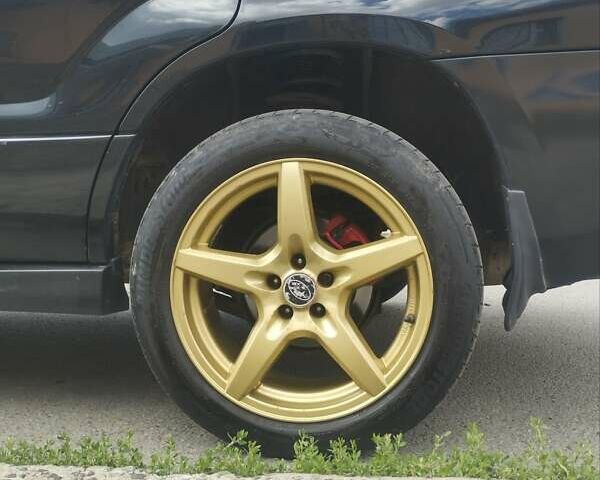 Черный Субару Форестер, объемом двигателя 1.99 л и пробегом 270 тыс. км за 7100 $, фото 7 на Automoto.ua