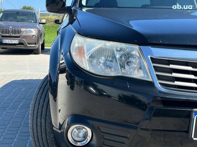 Чорний Субару Forester, об'ємом двигуна 2 л та пробігом 215 тис. км за 9590 $, фото 35 на Automoto.ua