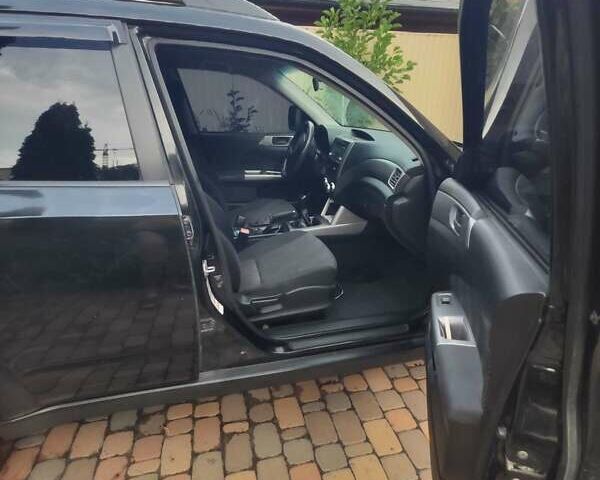 Чорний Субару Forester, об'ємом двигуна 2 л та пробігом 321 тис. км за 7500 $, фото 4 на Automoto.ua