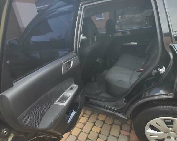 Чорний Субару Forester, об'ємом двигуна 2 л та пробігом 321 тис. км за 7500 $, фото 1 на Automoto.ua