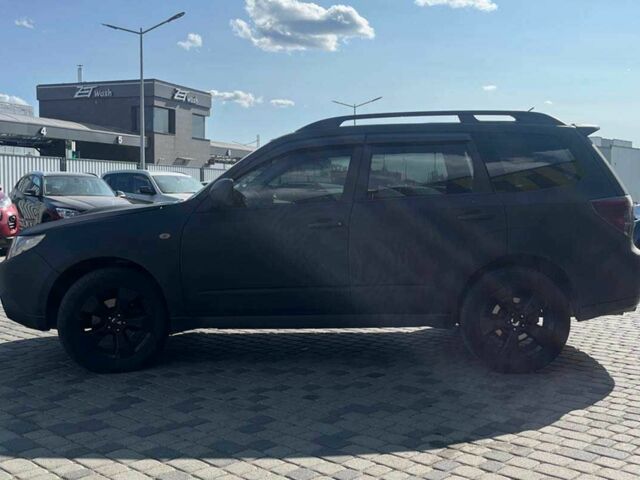 Черный Субару Форестер, объемом двигателя 2.5 л и пробегом 230 тыс. км за 7700 $, фото 3 на Automoto.ua