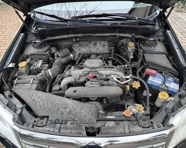 Черный Субару Форестер, объемом двигателя 2.5 л и пробегом 370 тыс. км за 8750 $, фото 14 на Automoto.ua