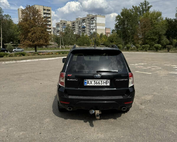 Черный Субару Форестер, объемом двигателя 2.46 л и пробегом 265 тыс. км за 7500 $, фото 3 на Automoto.ua